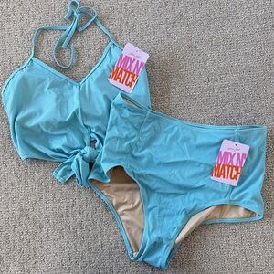 Kortni Jeane Blue Ribbed Bikini Set. Top Large. Bottoms XL.